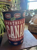 Front side of the metal trash can showing prominent Montreal Canadiens logo and text.