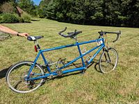 Full side view of bike outdoors on grass