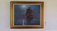 Full frontal image of the framed sailing ship artwork titled "Crescent Moon" depicting a night scene with ship and moonlight reflections on water.