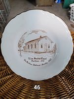Front of the ceramic plate showing Zion Baptist Chapel illustration with gold trim and descriptive text of the church and date.