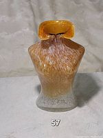 Murano style tortoise shell pattern glass vase, amber and brown tones with a ruffled top neck, standing at 7.75 inches tall.