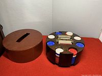 Photo showing poker chip holder inside and outside the brown leather carrying case with top handle and slot.