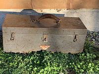 Closed Snap-on metal tool box showing front with logo and handle