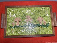 Full view of rectangular serving tray showing dark teak wood frame, handles, and mushroom mosaic tile surface.