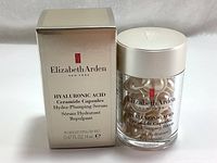 Photo shows the Elizabeth Arden serum box alongside the jar containing 30 capsules of the serum.