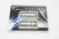 Two green Samsung 4GB PC3-12800 SO-DIMM RAM sticks in sealed plastic packaging with G.Skill branding