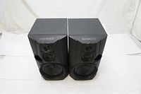 Pair of Kenwood LS-G4 bookshelf speakers side by side showing front view with drivers and bass port.