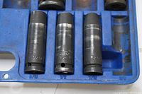 Close up of 6 impact extraction sockets with visible sizes and wear marks, showing different key types.