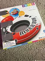 Box of Intex Lounge River Run inflatable river tube, depicting product and branding.