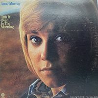 Front cover photo showing Anne Murray's image, title text, autograph and dedication.