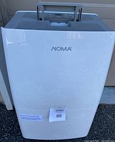 Front view showing white body, NOMA logo and overall condition