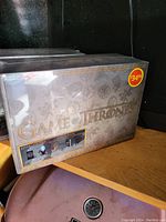 Photo of the unopened Game of Thrones DVD box set with original shrink wrap and price sticker showing $34.99