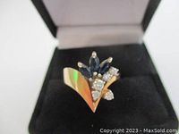 Ring displayed in new ring box, top view