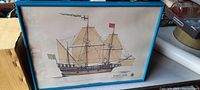 Framed print of Elizabeth II sailing ship showing full view including blue frame and the ship illustration with sails and rigging.