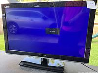 Front view of the 32-inch Sceptre television powered on with 'No Signal' displayed on screen.