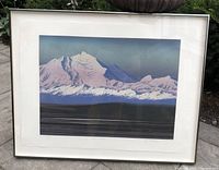 Framed signed lithograph of a mountain scene by Art Allen Smutylo, with matting and glass.