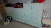 Front view of all three dressers showing overall set and condition
