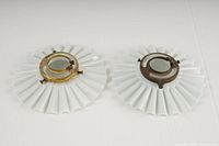 Top view of two vintage milk glass pleated pendant lamp shades with metal fixture rings, showing condition and pleated design.