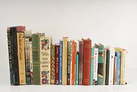 Front view of a collection of gardening and bird books arranged side by side.