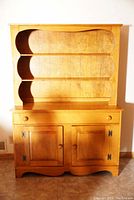 Front view of the VILAS buffet and hutch showing two open shelves on the hutch, two drawers, and two cabinet doors below.