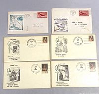 Front view of six vintage envelopes with stamps and cachets showing dates, locations and California mission illustrations.
