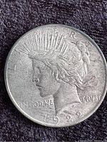 Obverse of 1922 Peace Silver Dollar showing Lady Liberty's head with 'LIBERTY,' 'IN GOD WE TRVST,' and date 1922.