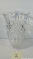 Front view of crystal vase showing diamond and vertical cut details