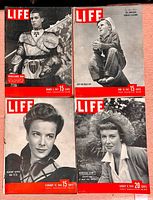 Four LIFE magazines arranged flat showing the cover images from 1947-1949.