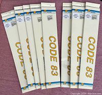 Ten boxed Walthers Code 83 track sections arranged on a surface, showing brand and product name prominently.