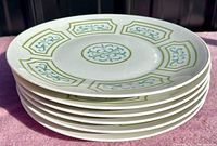 Stack of six Rosenthal Versailles pattern porcelain dinner plates showing edge detail and pattern.