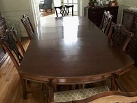 Overhead view of the mahogany dining table with chairs