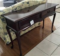 Front view of mahogany sofa table with drawers and Queen Anne legs