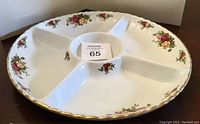 Front view of the round divided serving platter showing five compartments and floral Old Country Roses pattern with gold trim around the scalloped edge.