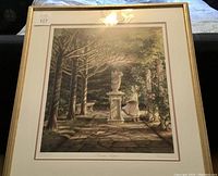 Full front view of the framed print showing the garden scene with girl and angel statue.