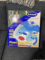 Front-facing image of the Dr Scholl's Foot Spa Plus box showing product image and branding.