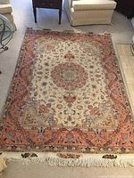 Full top-down view showing entire rug laid out on carpeted floor between furniture.