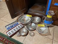 Overall view of two footed bowls, tray, handled bowl, shaker sets and glass pieces