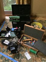 Overall lot: machine, green case, foot pedal, wooden box, bowl of spools, green thread