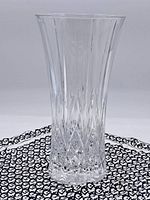 Full front view of vintage crystal vase, showing overall shape and design.