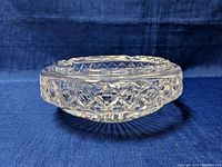 Side view showing the thickness and detailed cut patterns of the lead crystal ashtray.