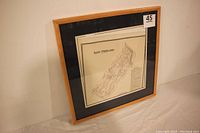 Angled shot of framed East Pikeland Township map in wood frame with black matting, showing overall condition and presentation.