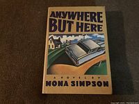 Front cover of the book Anywhere But Here by Mona Simpson showing illustrated dust jacket with car and figures.