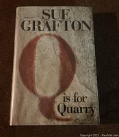 Front cover of the hardcover book "Q Is For Quarry" by Sue Grafton showing title and author.