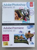 Front of retail box for Adobe Photoshop Elements 10 and Adobe Premiere Elements 10 software for Windows and Mac OS showing product branding and promotional images.