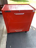 Frontal view of the red Mastercraft tool chest showing two drawers with metal handles and the brand name plate.