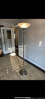 Full view of the 71-inch tall floor lamp with chrome finish and both the main and reading lights visible.