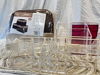 Full set of makeup organizers, brown placemat set, and beaded runner displayed on white background