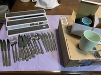 6 new 13 oz mugs, assorted pastel colors, in new condition with box visible