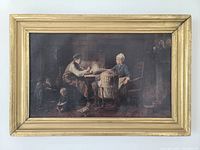 Photo of the framed painting showing a domestic dinner scene with two adults and a child, overall condition with some cracking of paint and no visible signature.