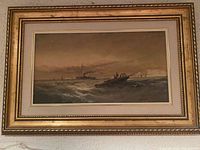Front view of framed maritime painting showing fisherman in rowboat, distant ships, and seagulls